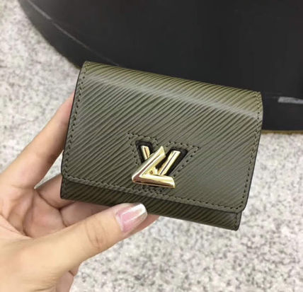 Louis Vuitton TWIST Leather Folding Wallets 