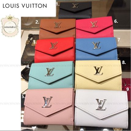 Louis Vuitton Leather Folding Wallets 