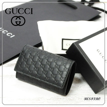 GUCCI Monogram Unisex Leather KeychainsBag Charms 