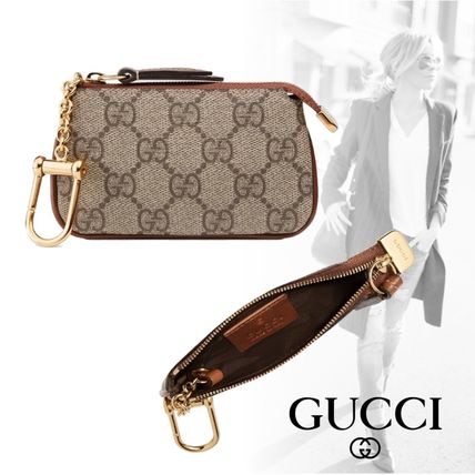 GUCCI Monogram Unisex Leather Logo KeychainsBag Charms