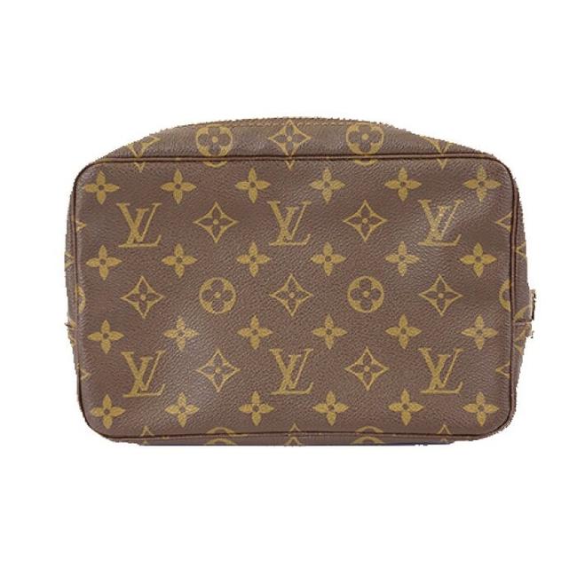 Louis Vuitton Trousse Monograms 23 Brown Canvas Clutch