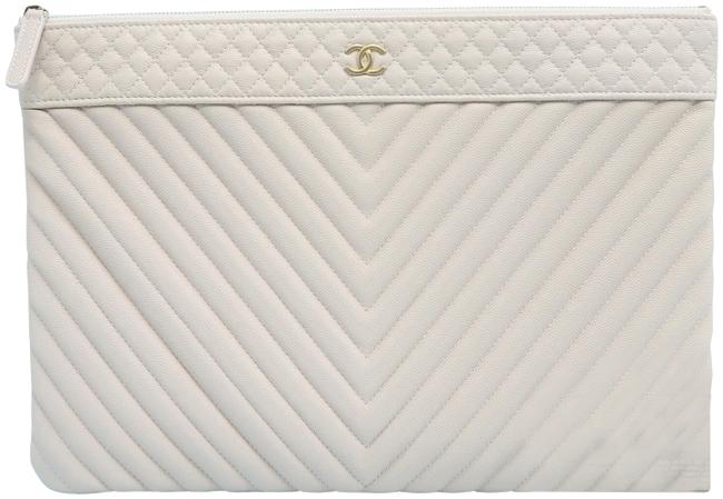 Chanel Chevron O case Nude Caviar Clutch 