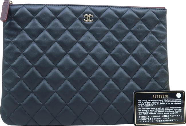 Chanel Quilted O case Black Calfskin Leather Clutch 