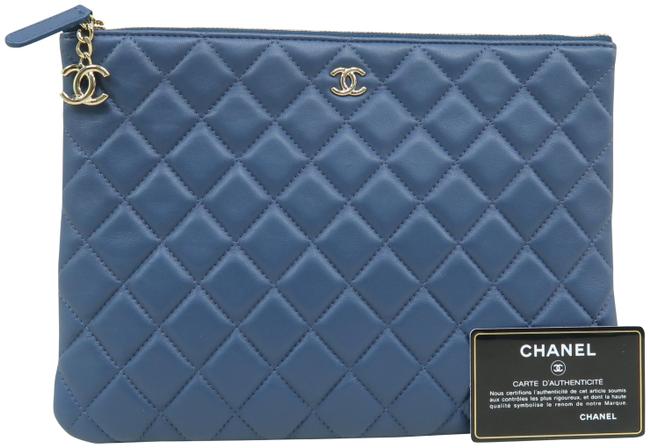 Chanel Quilted O case Navy Lambskin Clutch 