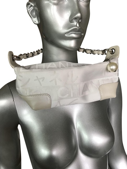 Chanel Mini Bag Cc Logo Pearl Mini BagWristlet Beige LeatherCanvas Wristlet