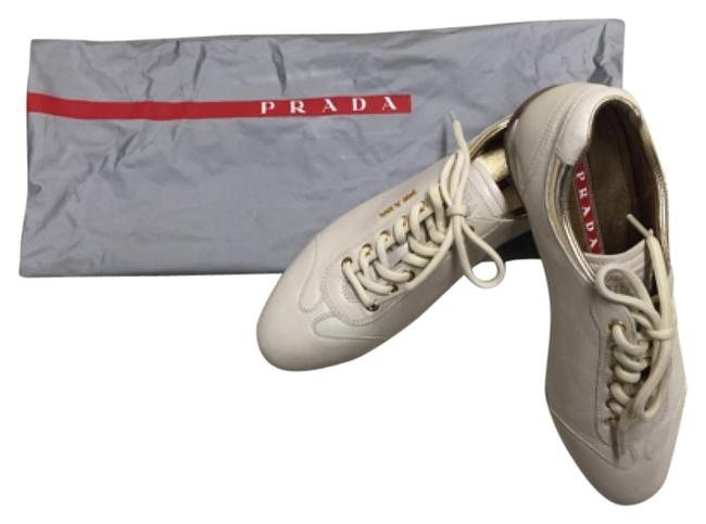Prada Ivory and Gold 3e 4900 Sneakers