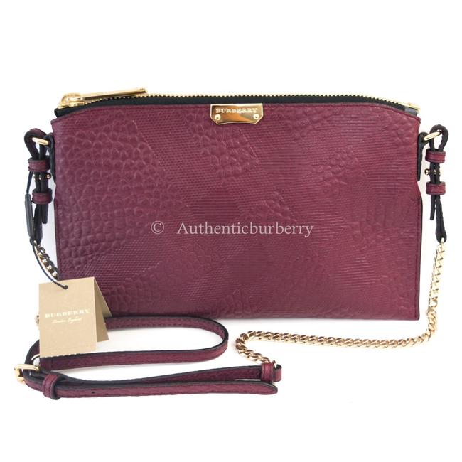Burberry Clutch Peyton Check Embossed Dark Plum Leather Cross Body Bag