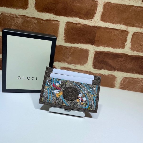 Replica 647942 Disney x Gucci Donald Duck card case Replica Handbags Gucci G Wallets
