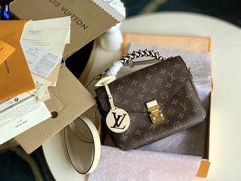 Replica Replica Louis Vuitton M45152 Pochette Metis Monogram Canvas Features a Braided Leather Top Handle