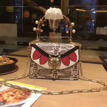 Replica Original Gucci 466428 Broche GG Supreme Snake Mini Bag